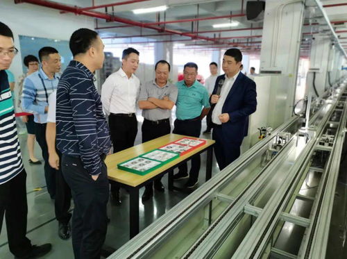 瑞士維多利亞大學一行蒞臨禾盈科技智慧工廠參觀交流